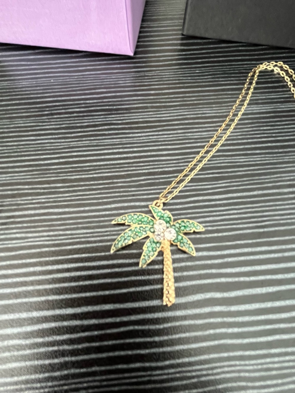 Gold Palm Tree Pendant Necklace with Green Crystal Leaves